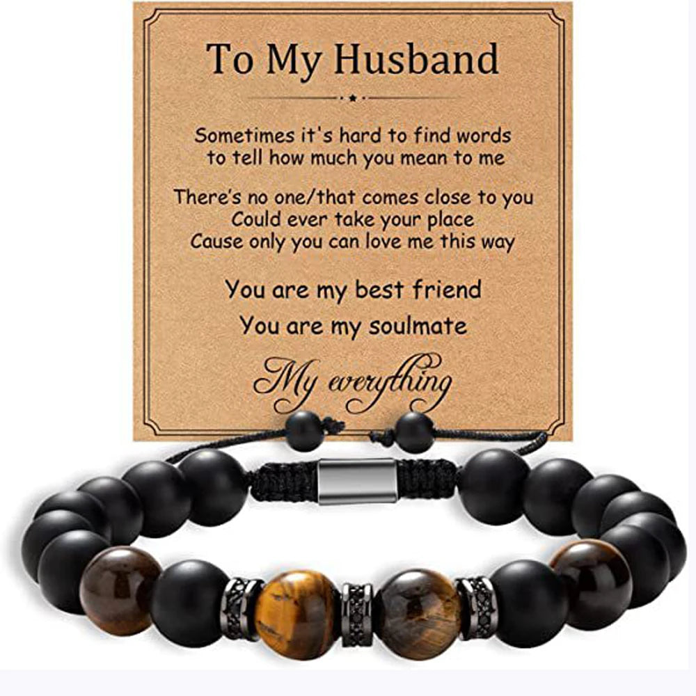 Black and brown beaded bracelet with sentimental message card for husband on a white background