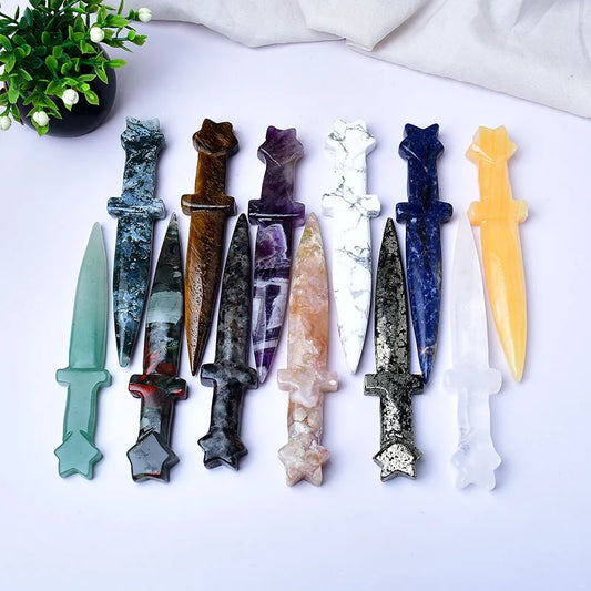 Experience the power and beauty of our Natural Crystal Gemstone Ceremonial Athames. Each athame is carefully crafted from high-quality materials to bring a touch of luxury to your ceremonial practices. 