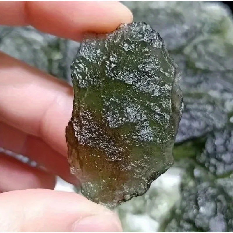 Enhance your meditation practice with our Irregular Moldavite Healing Stones. Crafted by nature, these stones offer unique and powerful energy that can help bring balance and focus to your mind. Connect with the healing properties of these sacred stones and elevate your meditation experience.