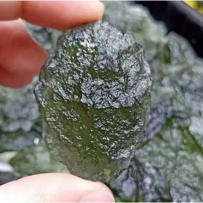 Enhance your meditation practice with our Irregular Moldavite Healing Stones. Crafted by nature, these stones offer unique and powerful energy that can help bring balance and focus to your mind. Connect with the healing properties of these sacred stones and elevate your meditation experience.