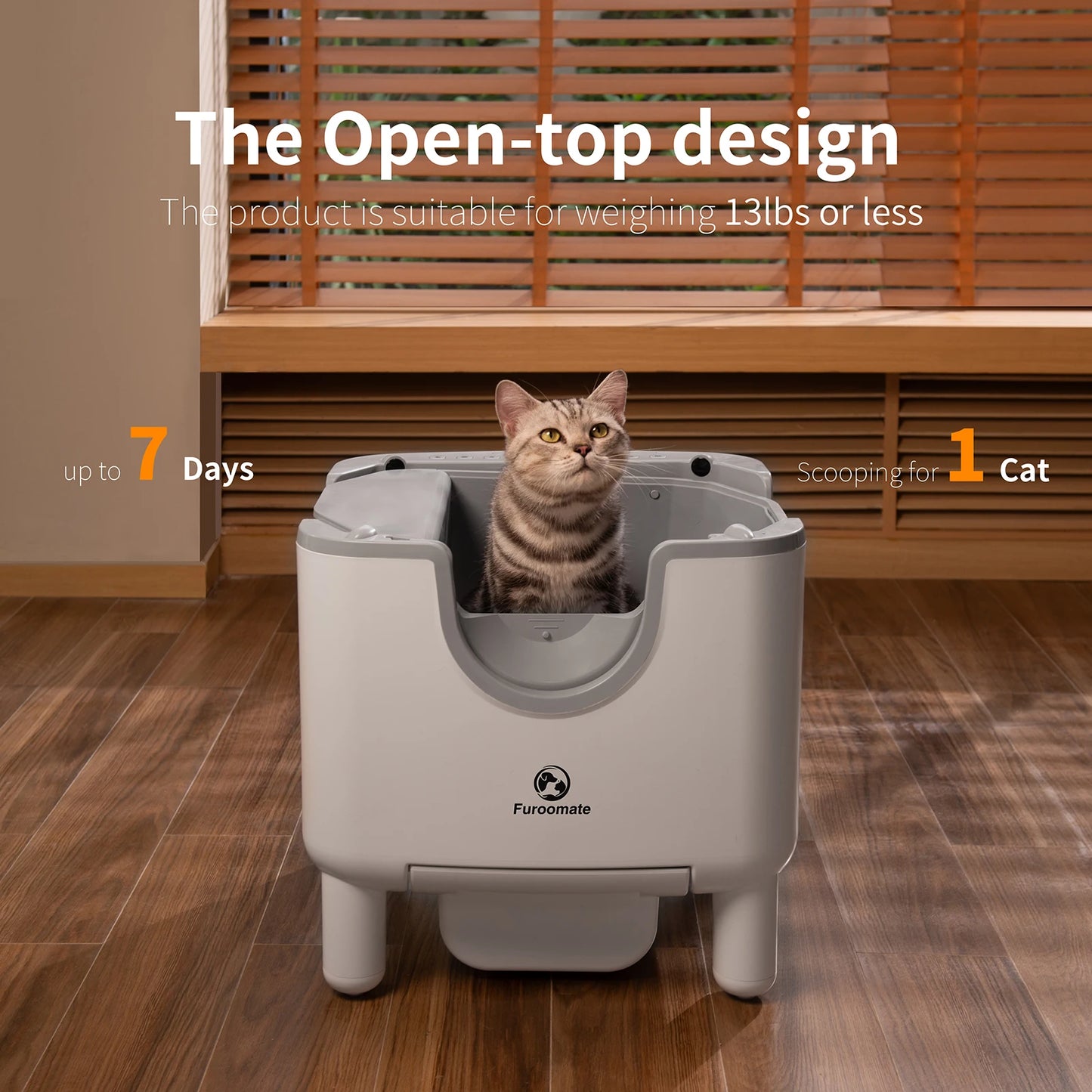 Cat using a pet litter box with text about its features on a wooden floor.