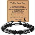Black beaded bracelet with a sentimental message card for a father on a white background