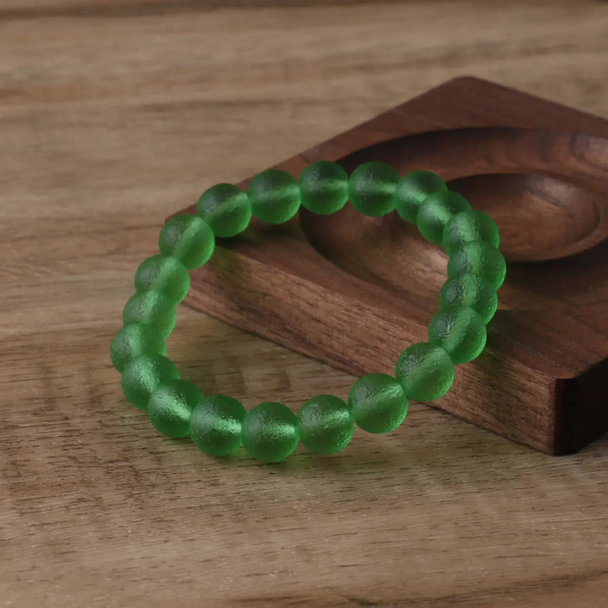 Experience the natural healing power of 10mm Moldavite crystal beads with our handmade beaded bracelets. Formed from a meteorite impact, these bracelets are believed to bring balance, protection, and spiritual growth. Wear them for daily wellness or meditation. Available now!