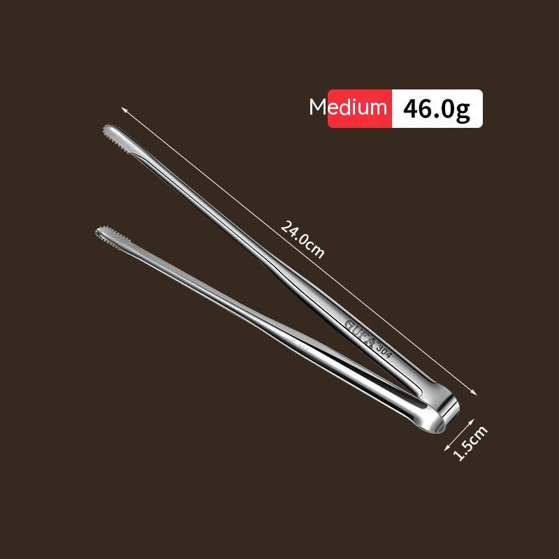 Metal tongs with measurements on a dark background