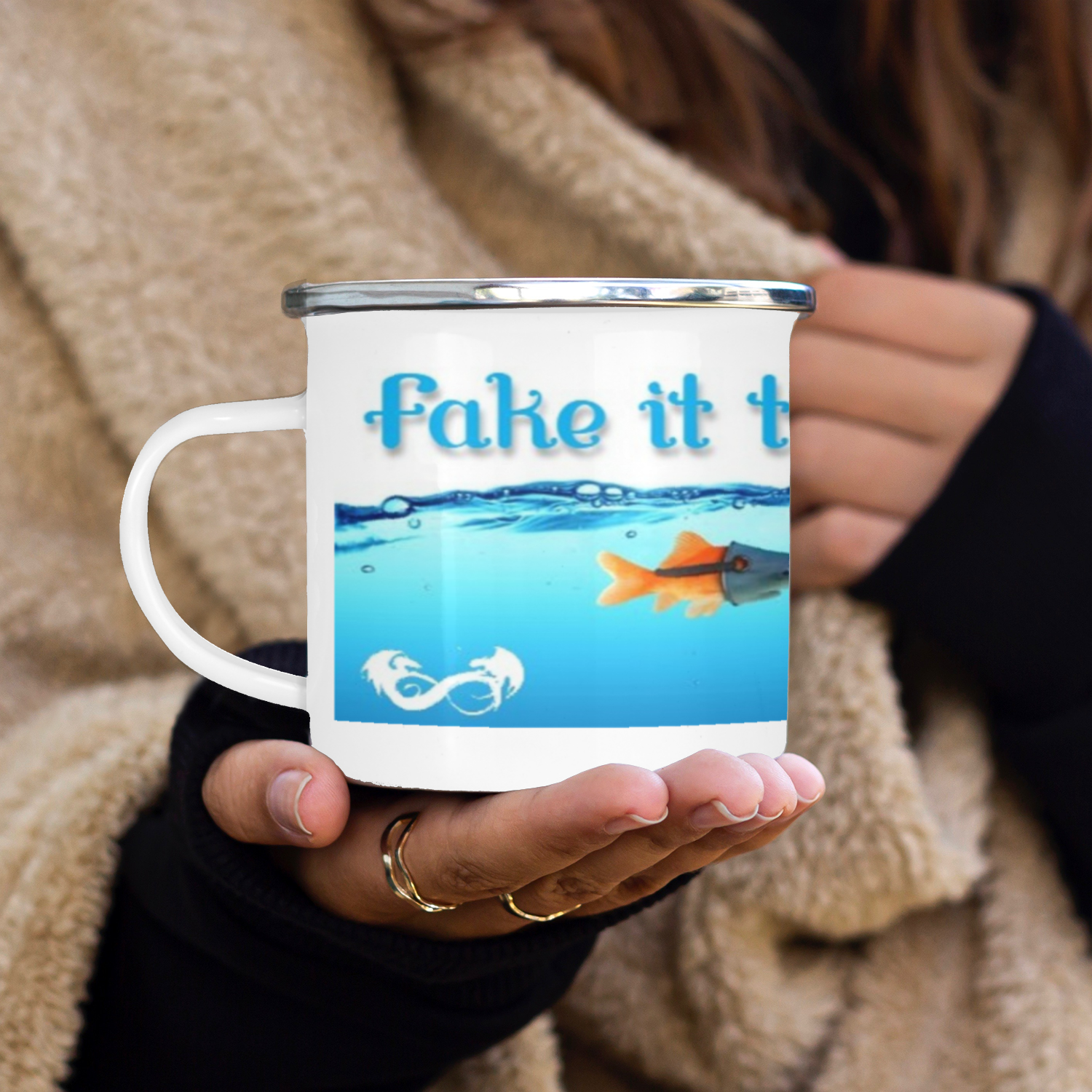 Fuel your determination and motivation with our Fake It Til You Make It Vintage Enamel Mug! This durable, retro-inspired mug serves as a daily reminder to keep pushing towards your goals. Perfect for your morning coffee or tea, it's a must-have for any go-getter.