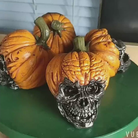 Unleash your daring spirit with these Halloween Resin Spooky Pumpkin Skulls! Add an eerie touch to your decorations and stand out among the regular pumpkins. Take a risk and embrace the spooky season with these unique and eye-catching skulls. 