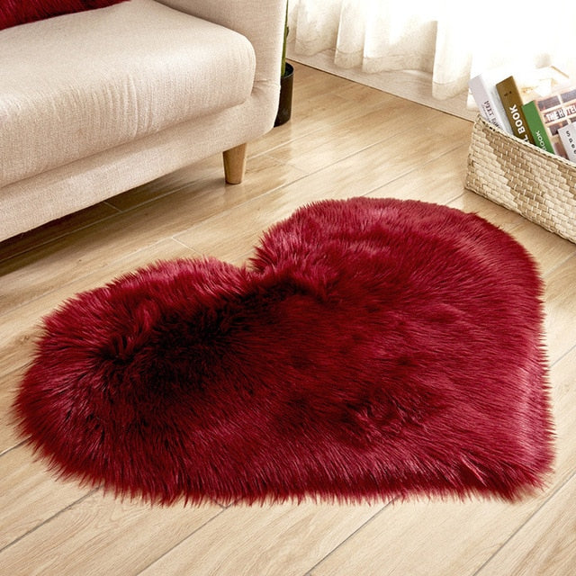 A beautiful soft artificial wool colorful heart rug with several colors to choose from makes the perfect Valentine's Day gift, birthday gift or special occasion gift. Choose the color that fits your unique style. Great for your bedroom, front room, kitchen, bathroom, office, zen room or any other place that you need a splash of color and a comfortable place to snuggle your toes into.