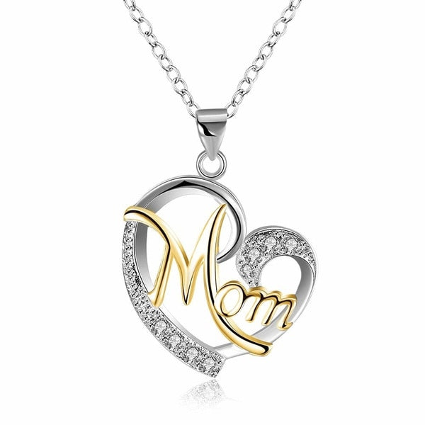 This exquisite Mom Heart Shape Inlaid Crystal Necklace adds an elegant touch of sophistication to any look. Crafted with exact precision and inlaid with shimmering crystals, this sophisticated necklace is a timeless piece of jewelry sure to be cherished for a lifetime.