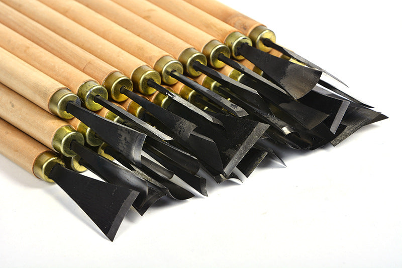This is a beautiful wood carving set that provides every angle that you might need to create any unique item from cups, dishes, sculptures, survival items and more.   Model: 2016-XG310 Material: Tool steel Full length: 245 (mm) Number of each kit: 31  Tool handle diameter: 12 (mm)