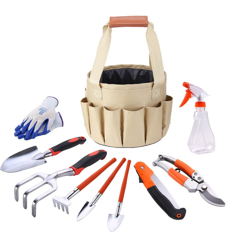 Unleash your inner green-thumb with this Mini 10 Pc Gardening Hand Tools Kit with Tote Bag! Planting, pruning, trimming, and watering are all a breeze with the help of this reliable set of handy tools. 