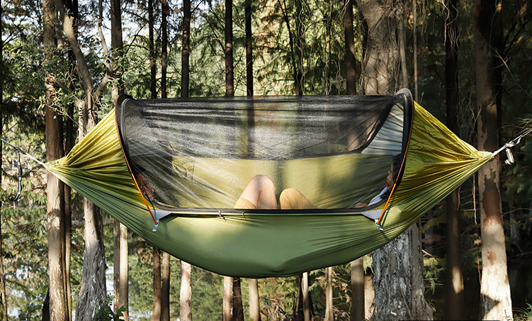 ﻿﻿This roomy outdoor swinging hammock is perfect for laying around a lake or at the campground, with the anti-mosquito covering you'll not have to worry about pesky bugs biting you while you relax with a book or take a lazy after noon nap. 