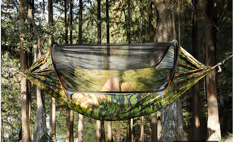 ﻿This roomy outdoor swinging hammock is perfect for laying around a lake or at the campground, with the anti-mosquito covering you'll not have to worry about pesky bugs biting you while you relax with a book or take a lazy after noon nap. 