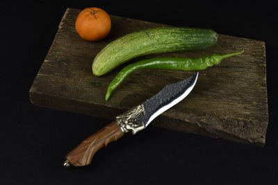 This beautiful Faucet Bone Knife makes a great addition to your home, the details are exquisite and the blade is sharp.  Features a detailed wolf on the handle.  Comfortable to hold and feels steady and strong while cutting. 
