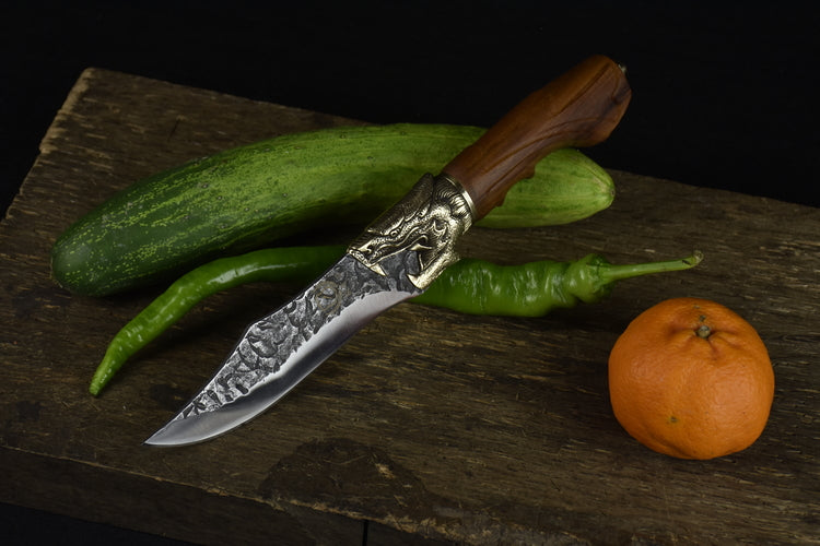 This beautiful Faucet Bone Knife makes a great addition to your home, the details are exquisite and the blade is sharp.  Features a detailed wolf on the handle.  Comfortable to hold and feels steady and strong while cutting. 