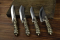 Dragon Handle Boning Knife Set Full length: 34.5cm Blade length: 18cm Handle length: 12cm Blade width: 3.5cm Thickness: 0.30cm Blade material: 7Cr17MOV (7 chromium 17 molybdenum vanadium steel) Handle material: brass Tooling: brass Net weight: 700g