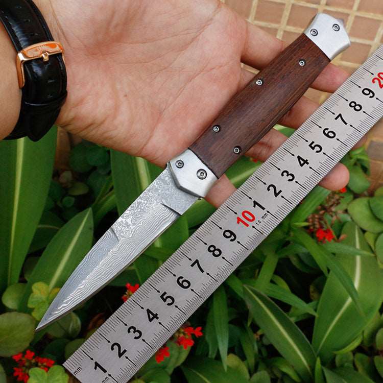 Full length: 22.8cm  Blade length: 9.3cm Handle length: 13.5cm Blade width: 2.1cm Blade thickness: 2.9mm Blade material: VG10 Damascus steel Weight: 185g Hardness: 57HRC Surface: Damascus original grain Handle material: chicken wing wood