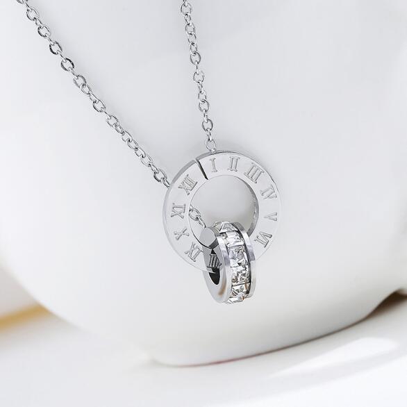 This Luxury Austrian Crystal Love Necklace is crafted from hand-selected Austrian crystals, giving it a brilliant sparkle. The roman numerals add a classic touch, ensuring it will never go out of style. Represent your love with this timeless piece, perfect for any occasion.