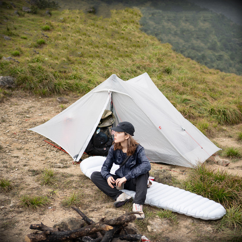 This professionals pole-less outdoor tent is ultra light and double sided with a silicone coating to make it comfortable and waterproof. This camping tent comes with all the equipment to set up and has a nice traveling pouch. 