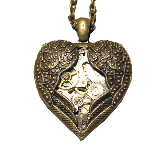 This steampunk gear heart necklace perfect addition to your Reissuance Fair outfit! Well made chain designed out of silver alloy and gold-plated with an inlay of artificial gems and semi-precious stones. The pendant is a lovely waterdrop or a heart.