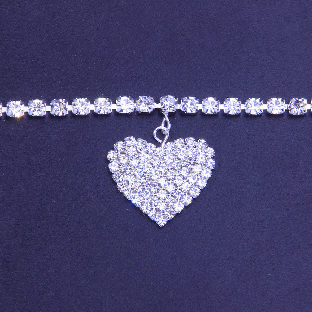 This classic and timeless Luxury Diamond Heart-Shaped Anklet offers a delicate and refined design crafted with intricate detailing and craftsmanship. Featuring genuine sterling silver plating and hand-set clear diamonds, this stylish anklet is sure to make a statement. The perfect combination of sparkle, quality, and elegance, this anklet is sure to last for years to come.