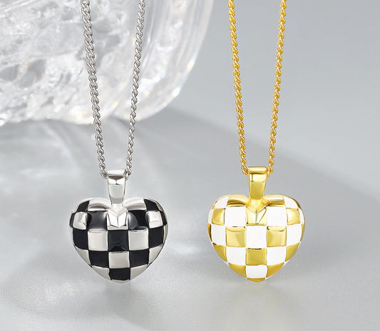 This beautiful S925 Sterling Silver Necklace features a delicate checkerboard heart pendant that adds a subtle luxe touch to any look. Crafted of the highest-quality sterling silver, this piece will maintain its brilliant shine for years to come. Delicately crafted with intricate details, this piece is sure to be cherished for a lifetime.