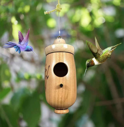 This adorable hand crafted hanging hummingbird house is the perfect gift for those that love nature. There are 3 different designs to choose from to enhance your patio, porch, treehouse, yard. 