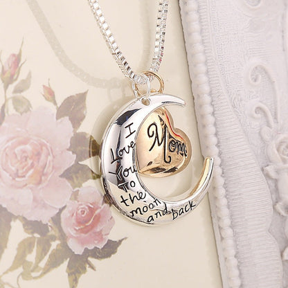 This exquisite sterling silver necklace is a thoughtful gift for the special mother in your life. Crafted with intricate detail, the To The Moon & Back, Heart Mother's Day Necklace is a timeless symbol of your cherished relationship. A perfect way to express your admiration and love.