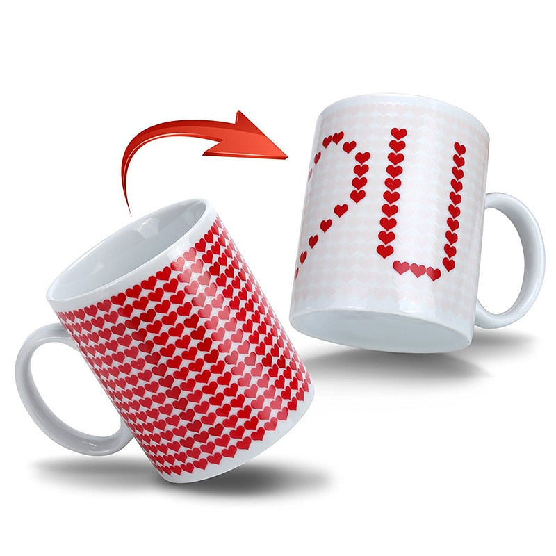 An adorable I Love You Magic Temperature Changing Mug that makes a great gift for the love in your life for Valentine's day, anniversary, birthday or any special occasion.  This cool mug changes from cute hearts to I love you when a hot drink is poured into the cup.