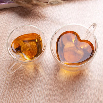This soft heart shaped double wall glass mug is perfect for that lovers picnic in the park. Enjoy hot or cold drinks while whispering I love you to your sweetheart. Makes a lovely Valentine's gift, anniversary gift, birthday gift or gift for any special occasion. 