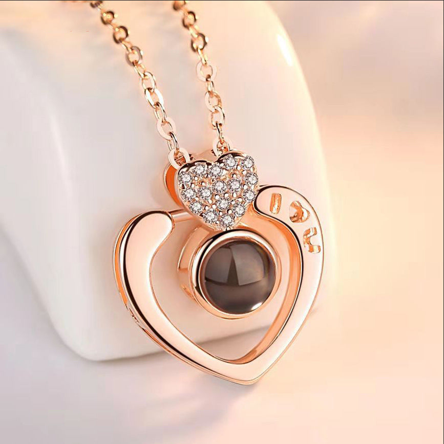 This unique necklace features a romantic message that can be read in 100 different languages, allowing the wearer to express their love in a truly special way. It is made of premium-grade materials and is hypoallergenic, making it a safe and luxurious gift for the special someone in your life.