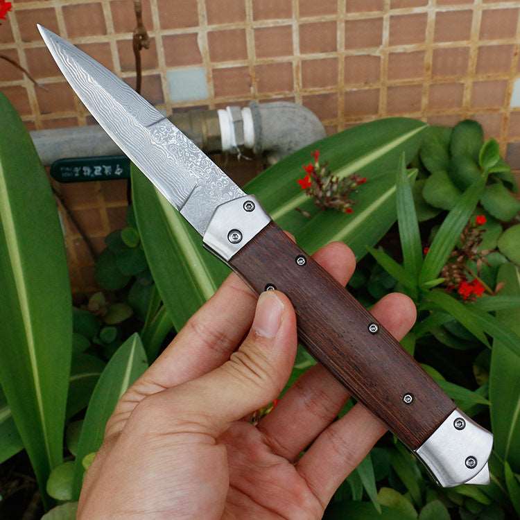 Full length: 22.8cm  Blade length: 9.3cm Handle length: 13.5cm Blade width: 2.1cm Blade thickness: 2.9mm Blade material: VG10 Damascus steel Weight: 185g Hardness: 57HRC Surface: Damascus original grain Handle material: chicken wing wood