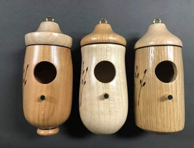 This adorable hand crafted hanging hummingbird house is the perfect gift for those that love nature. There are 3 different designs to choose from to enhance your patio, porch, treehouse, yard. 