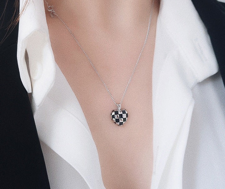 This beautiful S925 Sterling Silver Necklace features a delicate checkerboard heart pendant that adds a subtle luxe touch to any look. Crafted of the highest-quality sterling silver, this piece will maintain its brilliant shine for years to come. Delicately crafted with intricate details, this piece is sure to be cherished for a lifetime.