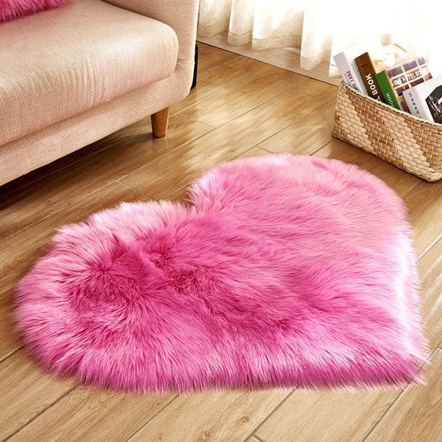 A beautiful soft artificial wool colorful heart rug with several colors to choose from makes the perfect Valentine's Day gift, birthday gift or special occasion gift. Choose the color that fits your unique style. Great for your bedroom, front room, kitchen, bathroom, office, zen room or any other place that you need a splash of color and a comfortable place to snuggle your toes into.