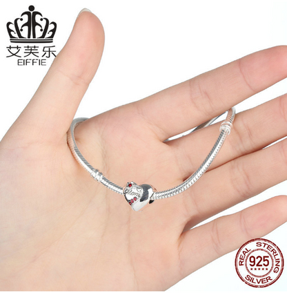 This S925 Sterling Silver Mom Charm is sure to make her smile. Crafted with attention to detail, this intricately designed heart-shaped charm is the perfect way to show your love and appreciation on any occasion. Made with genuine sterling silver, this charm is sure to last.