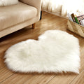 A beautiful soft artificial wool colorful heart rug with several colors to choose from makes the perfect Valentine's Day gift, birthday gift or special occasion gift. Choose the color that fits your unique style. Great for your bedroom, front room, kitchen, bathroom, office, zen room or any other place that you need a splash of color and a comfortable place to snuggle your toes into.