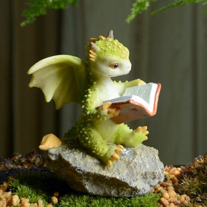 Cute Magical Dragon Statue for micro-landscaping in your garden  or home. The Sculpture is made of Resin and perfect for home Crafts or holiday Decoration, Ornaments or Figurine Collection. A perfect Gift for anyone on any occasion. 