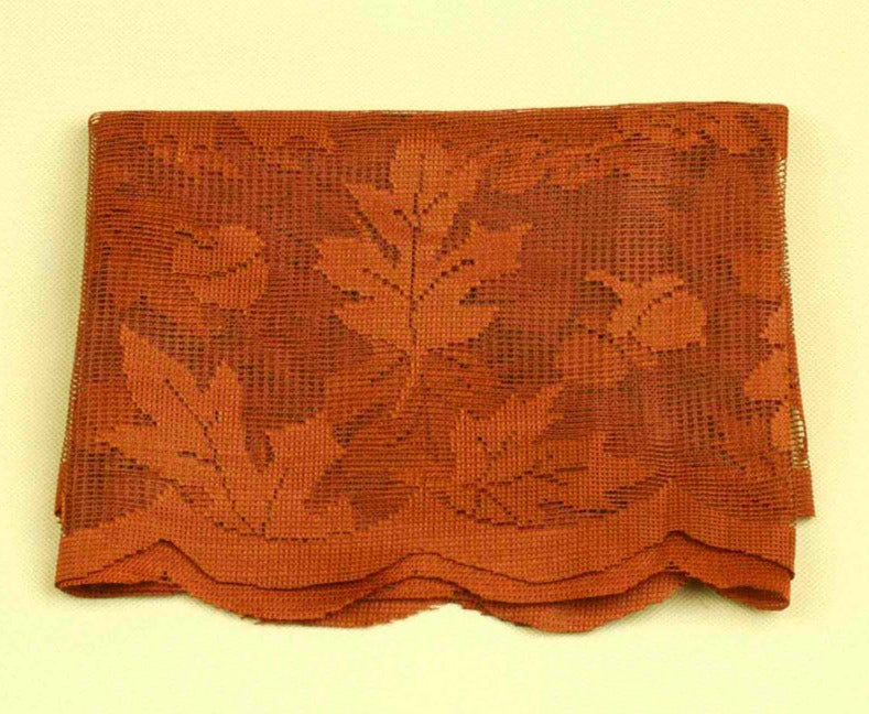 This high quality autumn table runner is made with a lovely maple leaf design in lace and would be perfect for fall decorations or for your Thanksgiving dinner. 