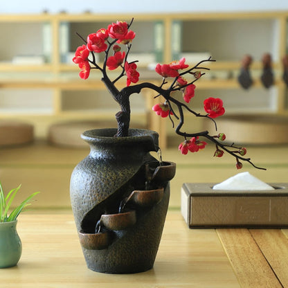 A beautiful simulated flowering plant with waterfall vase for a perfect interior decoration, desktop landscape mini waterfall in your room. Great for meditation, yoga, breath work and self-care.
