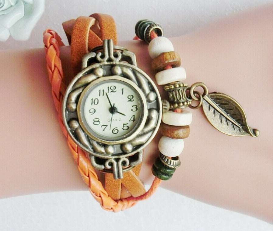 Genuine Leather Vintage Style multicolor High Quality Quartz Watch with a Lovely Bracelet with a snap back.