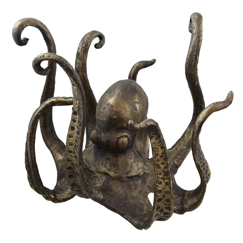 This Bronze Octopus is the perfect table topper for your next party. It holds your mugs for easy access, so party goers can dip into your punch at ease. The arms of this Octopus mug holder is perfect to hold small to medium size mugs and is a unique decoration to celebrate your unique style. 