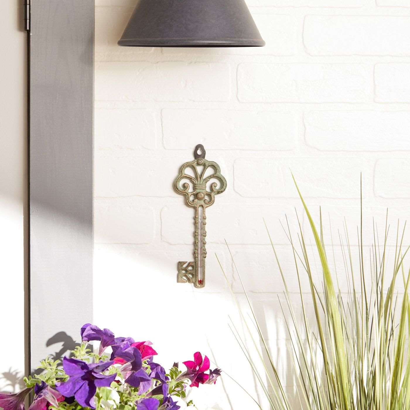 This easy to hang iron décor is beautiful and functional. Keep track of temps while enjoying the ornate beauty of the design. Hang this durable cast iron thermometer on your porch, deck, fence, garden shed, garage or even a tree to add a bit of functional décor to your garden or yard space.