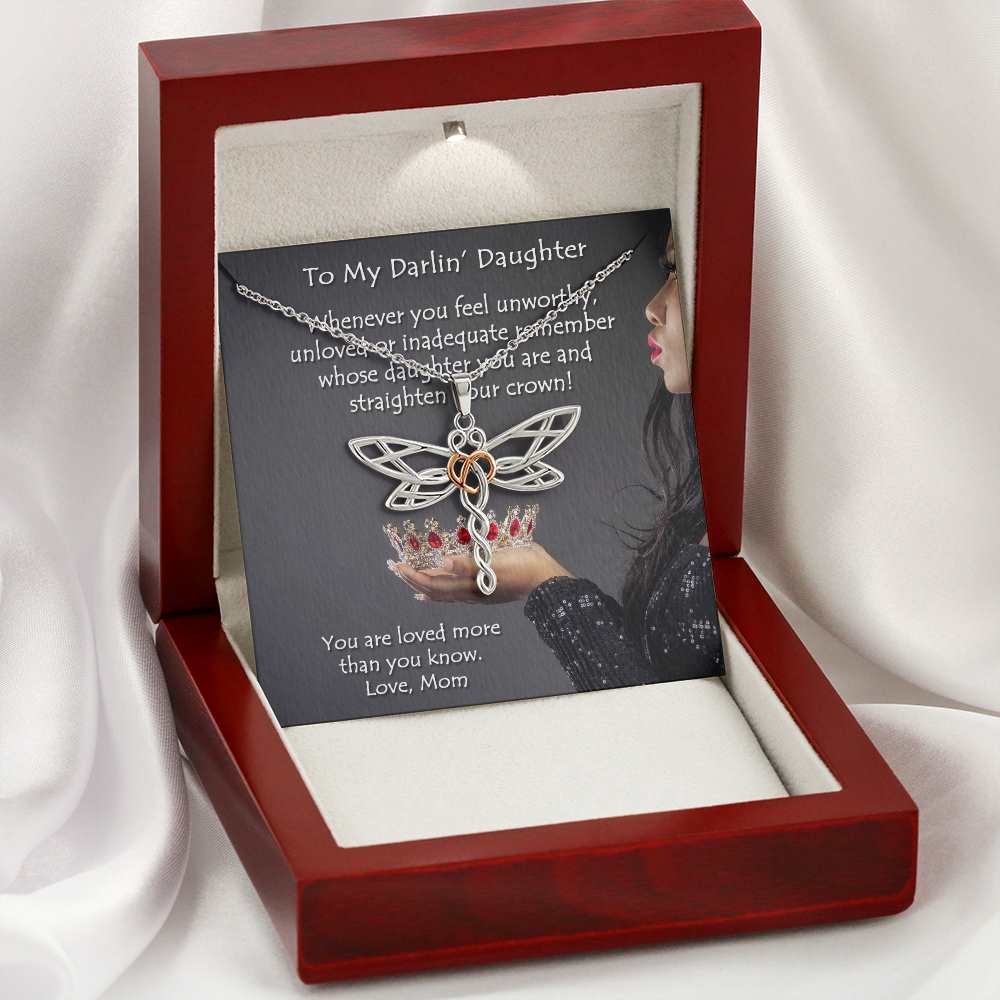 This beautifully styled Dragonfly pendant is crafted from polished stainless steel and finished with a rose gold heart. A lovely piece that is sure to enhance any outfit.