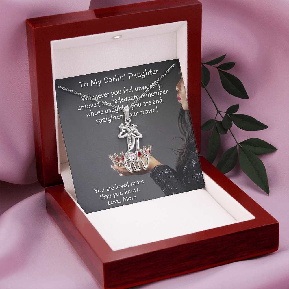 This adorable Graceful Love Giraffe Necklace features sparkling cubic zirconia, and is available in your choice of 14K white gold or 18K yellow gold finishes.  A perfect gift for wives, girlfriends, daughters, granddaughters, best friends, or any one who loves animals