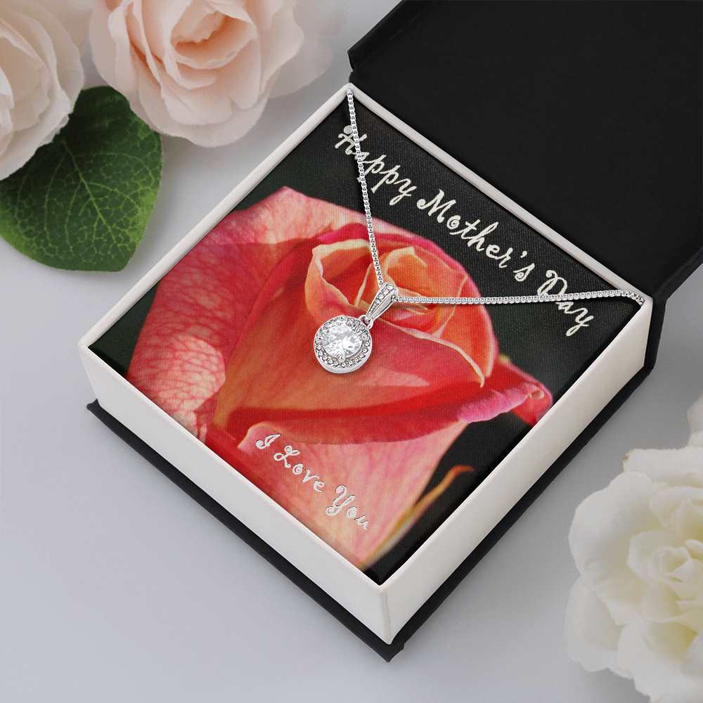 Surprise your loved one with a timeless and elegant gift, our dazzling Eternal Hope Necklace. Sparkling like a star in the sky, the pendant features a cushion cut center cubic zirconia, adorned with smaller, yet equally eye catching cubic zirconias, suspended along an adjustable box chain.