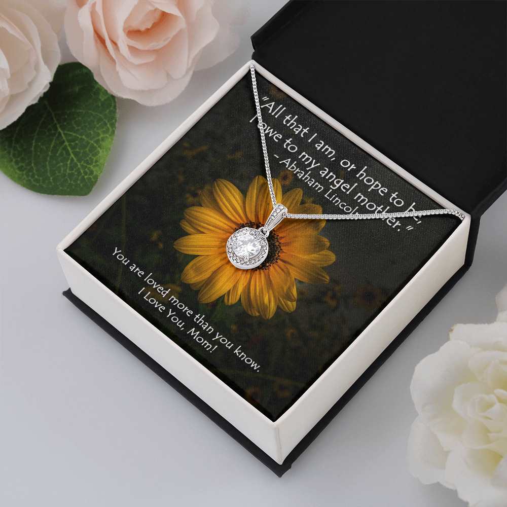 Our dazzling Eternal Hope Necklace. Sparkling like a star in the sky, the pendant features a cushion cut center cubic zirconia, adorned with smaller, yet equally eye catching cubic zirconia, suspended along an adjustable box chain. Don't wait, get yours today! 