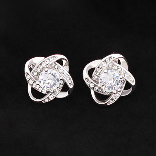 These gorgeous Love Knot Stud Earrings are a timeless fashion essential and the perfect accessory to bring a touch of sophistication and elegance to any ensemble. Crafted from high-quality materials and with intricate detailing, these earrings are luxurious pieces that will never go out of style.