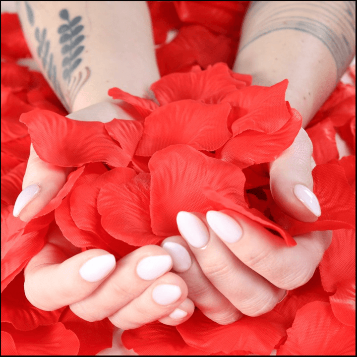Elevate the moment with these 500 lifelike red rose petals.