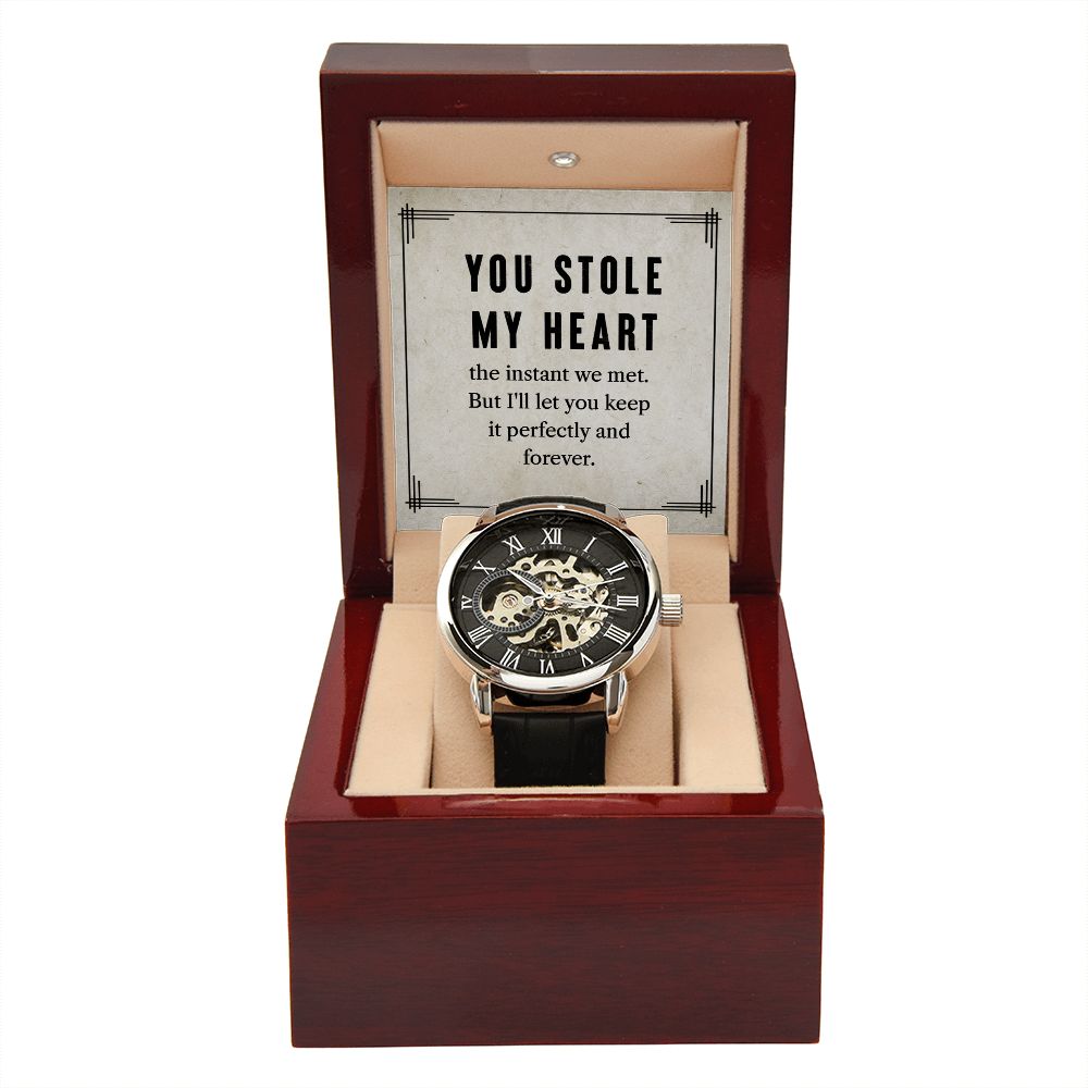 This watch sports a genuine leather strap, is splash resistant, and has increased durability thanks to hardened mineral glass. Our unique skeleton dial feature allows you to peer directly into the inner workings of your watch. Beautifully crafted to be automatic, this watch requires motion instead of batteries. 