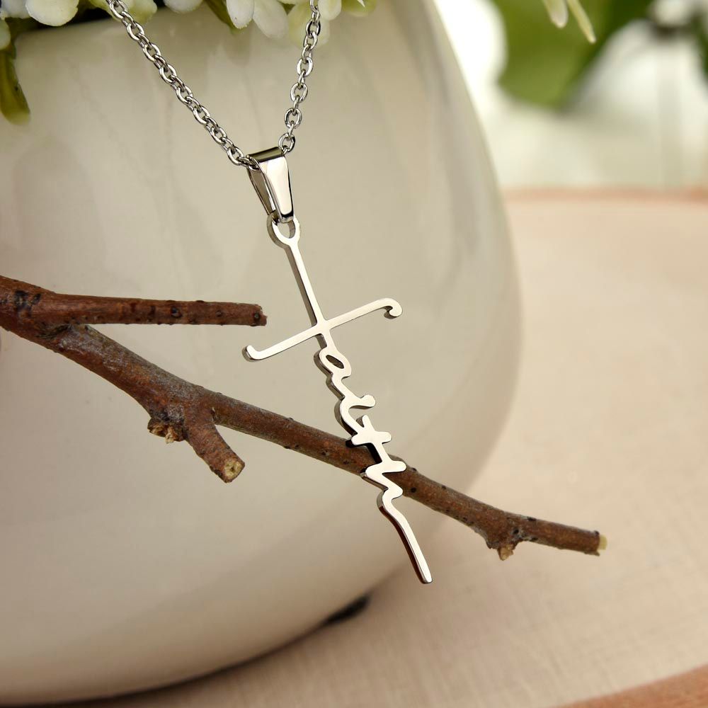 What better way to showcase your faith than with a stylish, everyday accessory? The Faith Cross Necklace allows a beautiful expression of hope that will instantly elevate your wardrobe. This dazzling piece is white gold dipped and features a perfectly sized pendant, which makes sharing your beliefs undoubtedly easy.